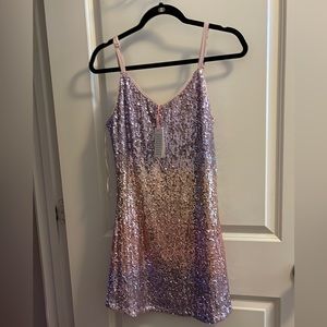 New, with tags. Ombré colored sparkly dress